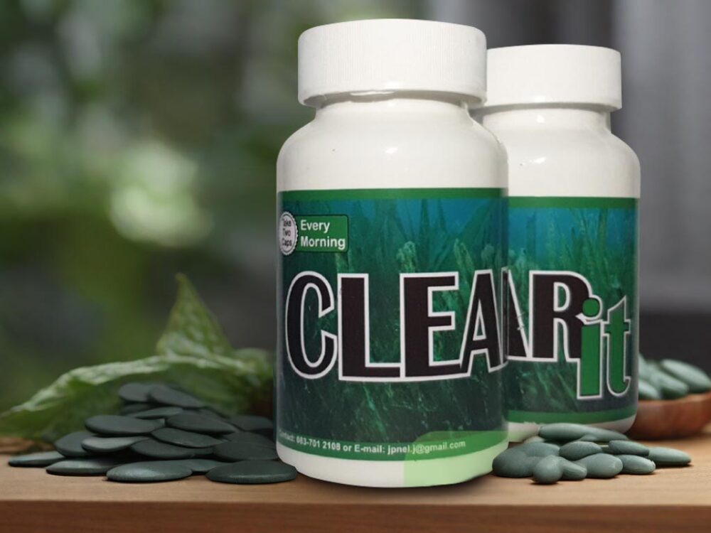An image depicting a bottle of CLEARit, a health supplement featuring natural ingredients like Kelp, Zinc Picolinate, and Selenium AAC. The bottle is surrounded by vibrant imagery symbolizing vitality, wellness, and holistic health.