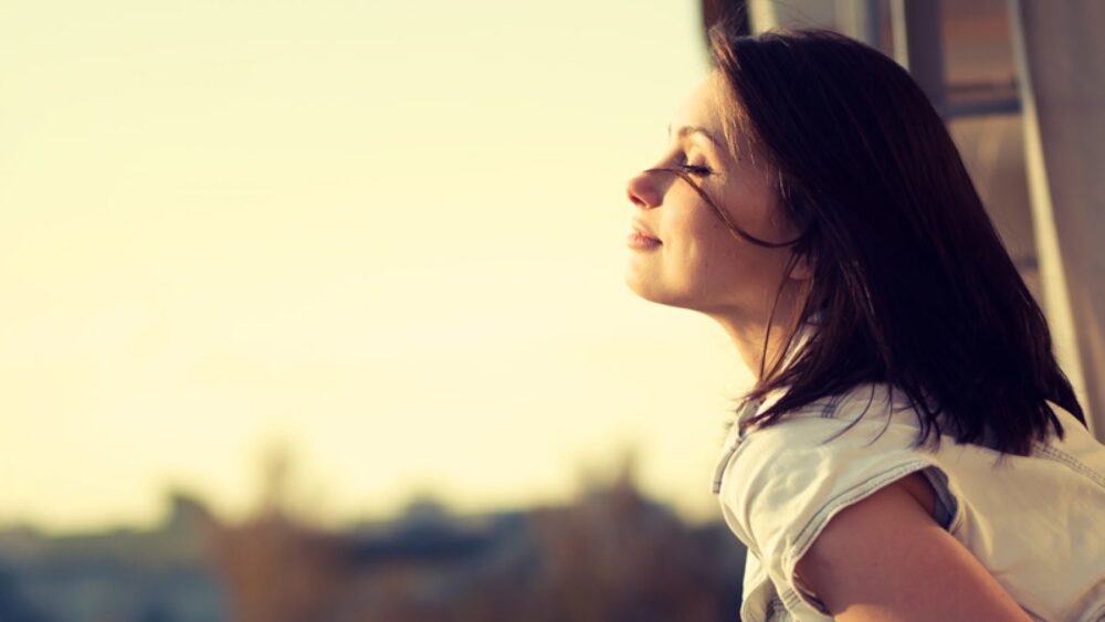 Happy and relaxed person, showcasing the benefits of Intervene Herbal